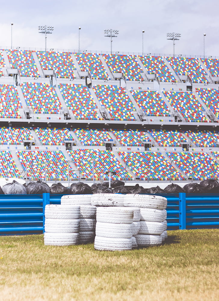 black plastic, colorful, colourful, stadium, stands, tires, wheels