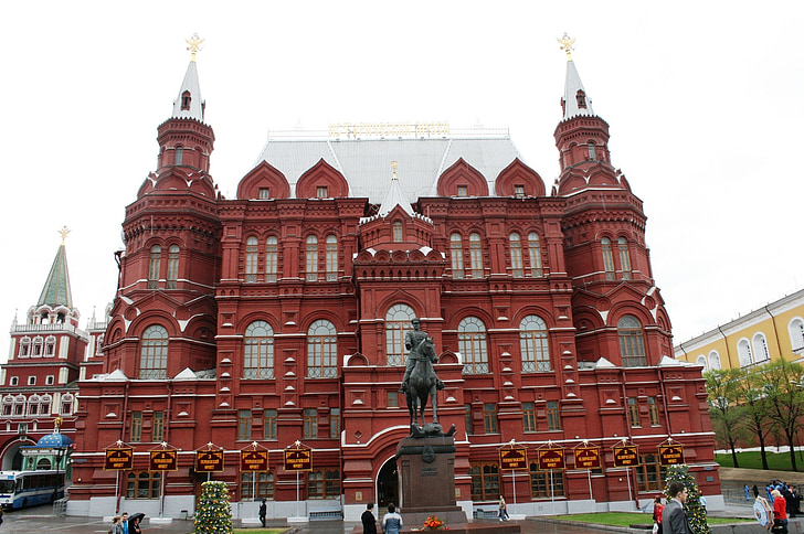 state history museum, red brick, windows, silver roof, statue, marshall zhukov, moscow