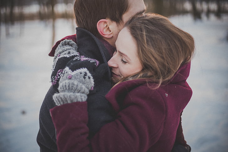 romance couple, hugging, wool coat, winter, snow, peaceful, serene