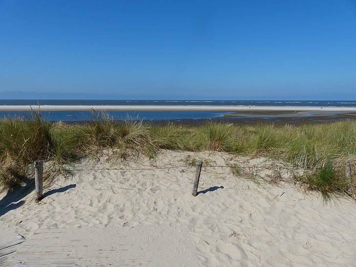walk on the beach, sand, white, bright blue sky, clear, langeoog, east frisia