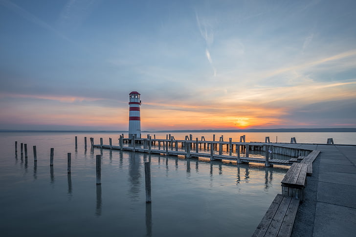 lighthouse, wharf, pier, ocean, water, sun, clouds