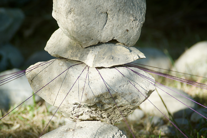 stone, sculpture, threads, violet, stretched