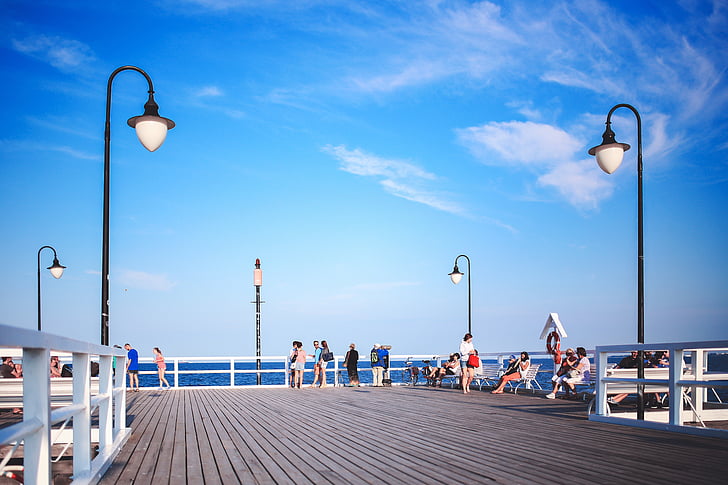 people, pier, molo, sky, blue, streetlights, clouds