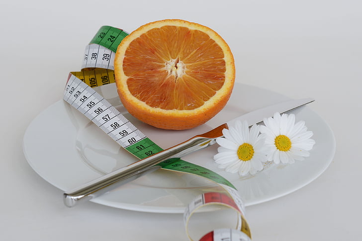 remover, laranja, frutas, nutrição, margaridas, fita métrica, dieta