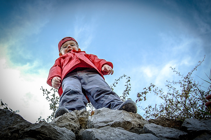 boy, the height of the, mountains, rocks, child, small, outdoors