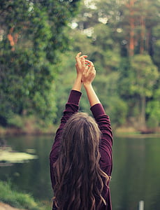 woman, raising, hands, facing, lake, yoga, stretch