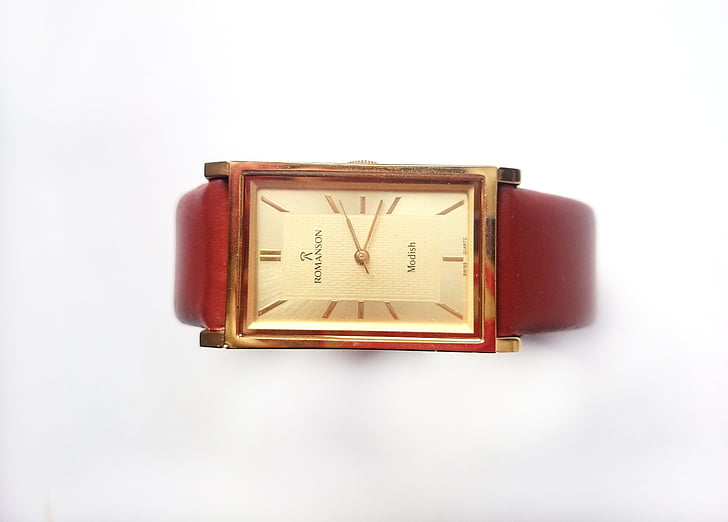 clock, wrist, leather belt, strap, gold dial, white background, brown