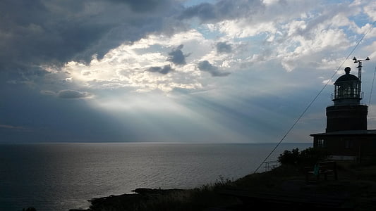 Lighthouse, kusten, Sverige, darck, solljus, solens strålar