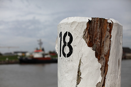 bollard, water, wooden posts, anchorage, pier, coast, brunsbüttel germany