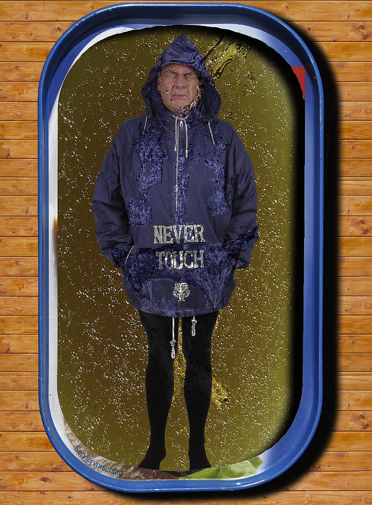 man, rain jacket, tin of sardines, oily, clothing, person, pose