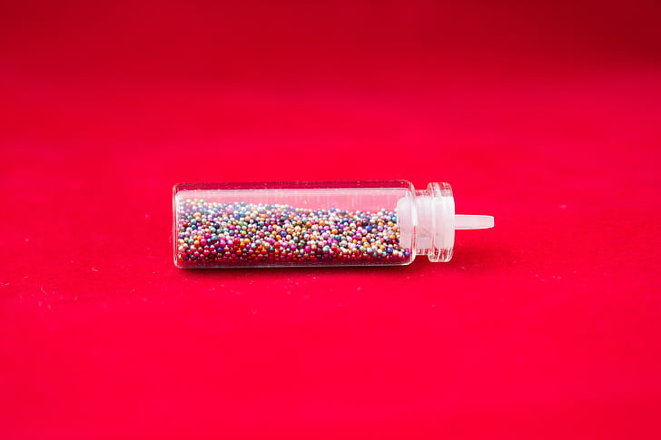 jars, tinsel, capacity, manicure, ornament, jewelry, red background