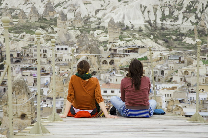 personer, klippformationer, Fairy chimney, Nevsehir provinsen, Cappadocia, Göreme, Turkiet