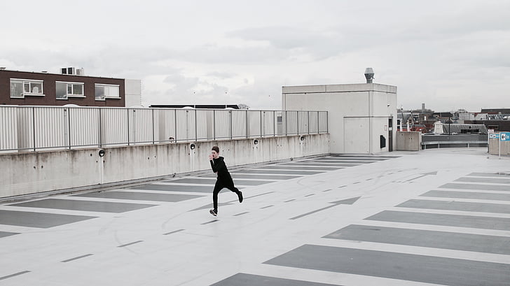 man, running, rooftop, architecture, building, structure, sky