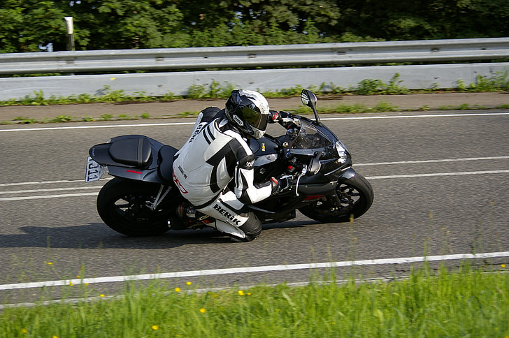 motorcycle, knee grind, suzuki, curve, man, eifel, side view