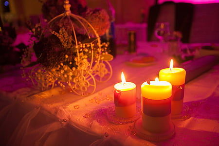 lighted, pillar, candles, table, setup, cloth, flower