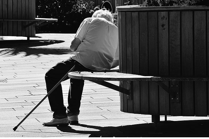 adult, bench, black-and-white, cane, chair, city, man