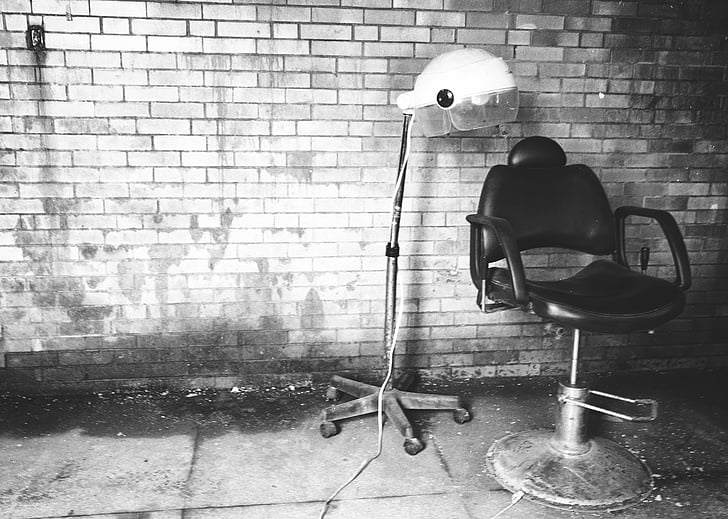 grayscale, photo, barber, chair, beside, brick, wall