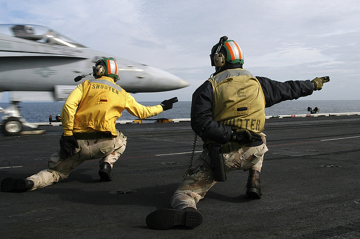 sailors signal to launch, jet, aircraft carrier, military, plane, f-18, hornet