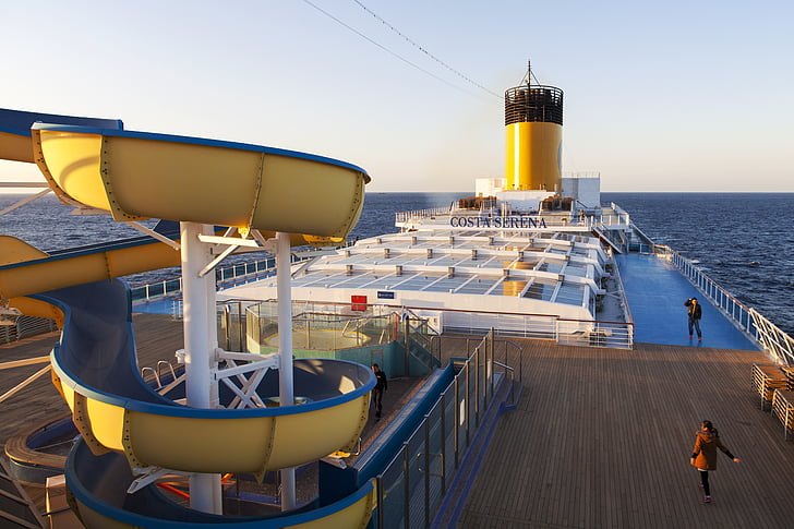 costa crociere, selena no, bright yellow chimneys, on the top deck water slides