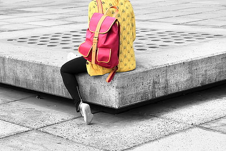 bag, colourful backpack, fashion, grey concrete, model, person, printed yellow shirt