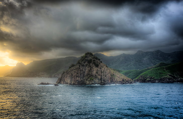 nuva hiva, marquesas islands, french polynesia, south pacific, storm clouds, sunset, sea