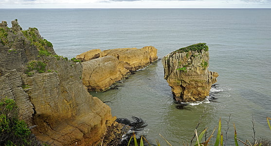 млинець порід, Нова Зеландія, Західне узбережжя, Південного острова, Скеля