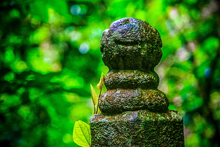 stone carving, armrest, blur, stack, balance, day, focus on foreground