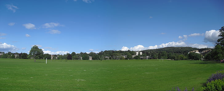 playing field, sports field, grass, meadow, green, village, mountains