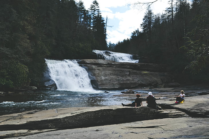 people, waterfall, outdoors, water, flowing, person, family
