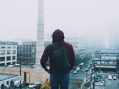 man, maroon, hoodie, standing, daytime, city, one man only