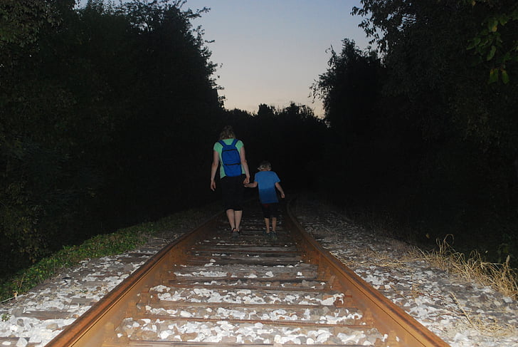 dark, walking, railway, boy, woman, mother, son
