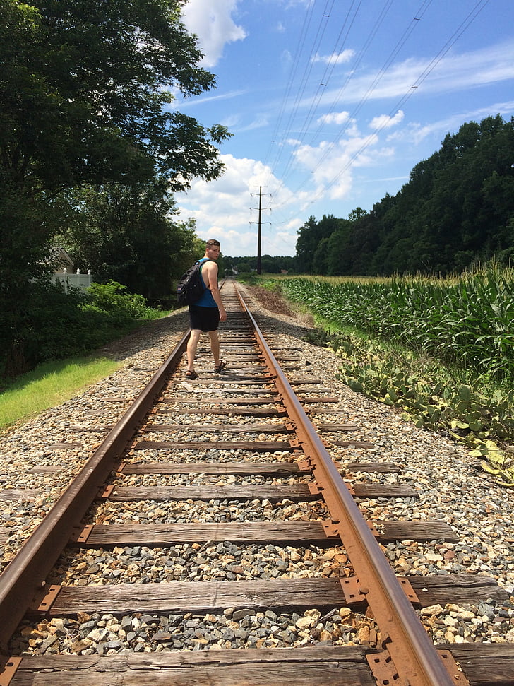 rails, railroad, tracks, young people, teens, teen boy, traveler