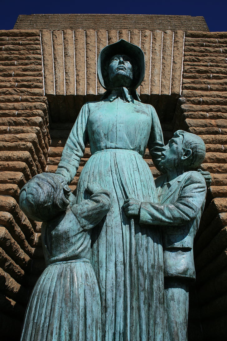 pioneer statue, statue, bronze, woman, children, boy, girl