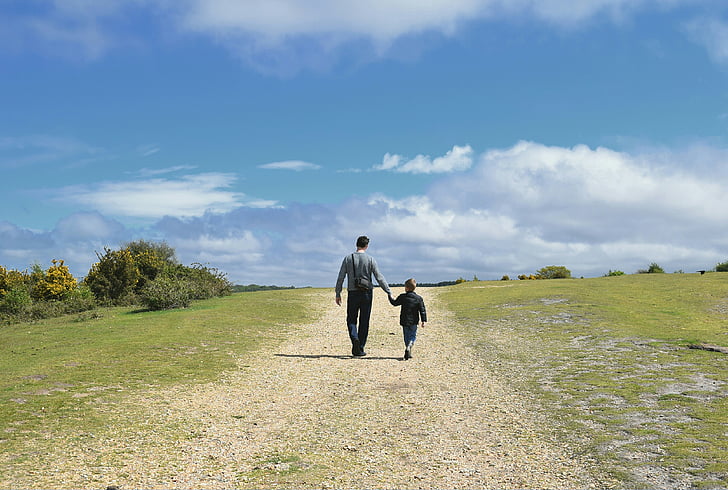 family, father and son, walking, sunny, footpath, sky and clouds, countryside