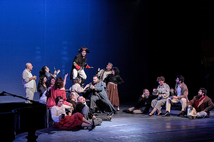 theatre, aysen, chorus, sitting, mid adult, medium group of people, young adult