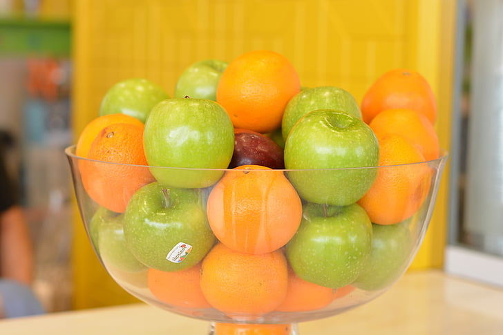 frutes, jabuke, naranče, staklena činija, vitamini