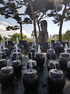 twee water hoofd, jar fontein, twee pot Waterfontein