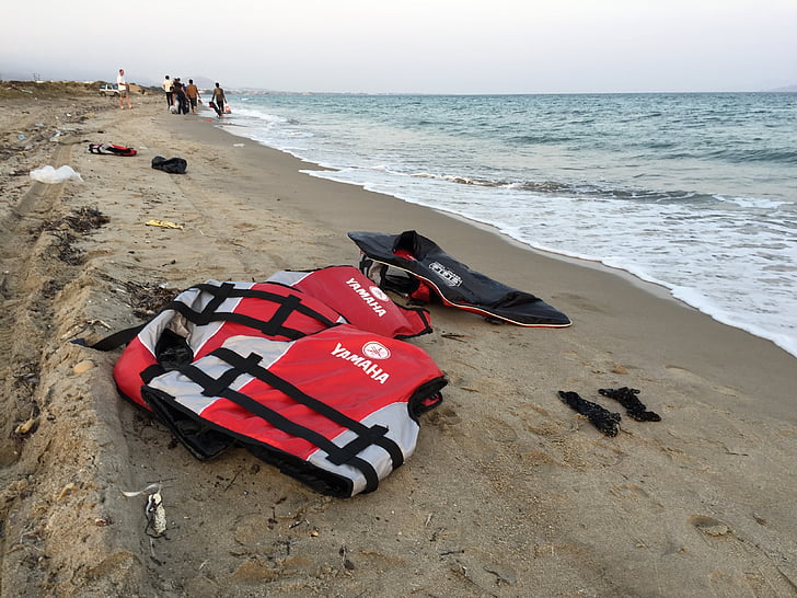 life vest, beach, refugees, greece, leave, flights, sea