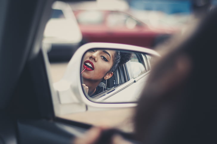person, showing, white, automotive, side, mirror, car