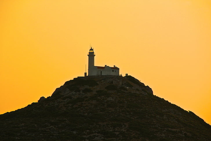 Lighthouse, gula sky, solnedgång, färgsprakande solnedgång, gul