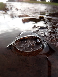water, water bubbles, rain, flow, black and white, pavement, puddle
