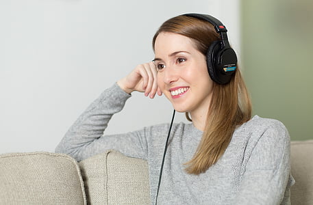 woman, gray, sweater, smiling, wearing, headphones, girl