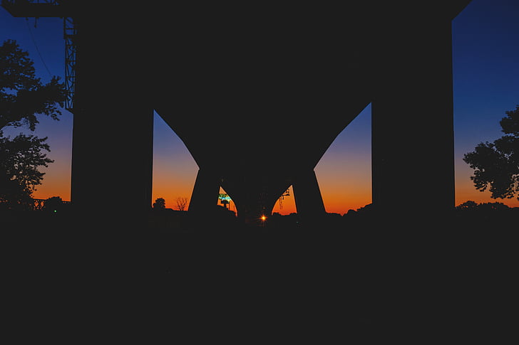 silhouette, photo, bridge, near, trees, orange, sunset