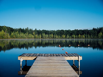 grey, brown, wooden, dock, near, body, water