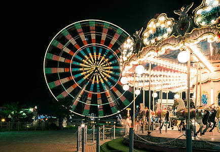 blurred motion, carnival, carousel, children, color image, enjoyment, ferris