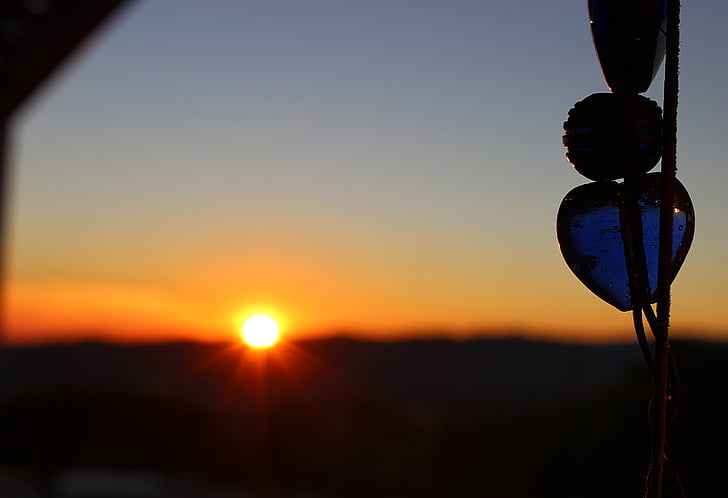 blue, heart, shaped, hanging, beads, sunset, silhouette
