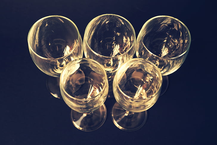 above, close-up view, olympic, wine glasses, no people, black background, close-up