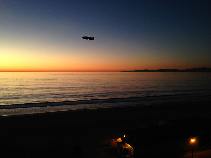 airship, blimp, sunset, beach, peaceful, sea, sky
