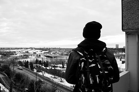 black, white, photo, man, standing, rooftop, daytime