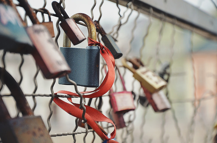 chain link fence, locks, locked, red, ribbon, padlock, lock